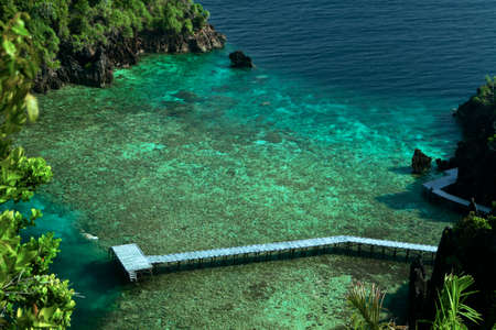 Karawapop Jetty, a heart-shaped lagoon in the cluster of West Papua island, Raja Ampat Indonesiaの写真素材