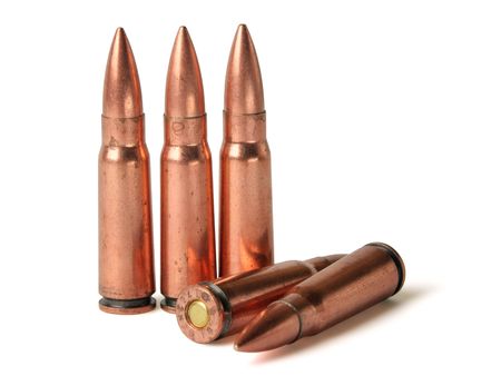 three scratched cartridges are stand and two lie on white background