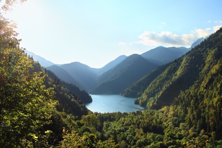 Beautiful landscape of Rizza lake at the mountains under almost clear skyの写真素材
