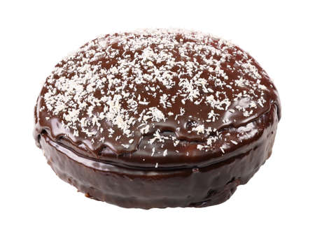 round glazed cake sprinkled with coconut flakes isolated on white background.の写真素材