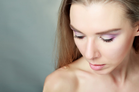 fashion model with bright makeup and manicure handsの写真素材