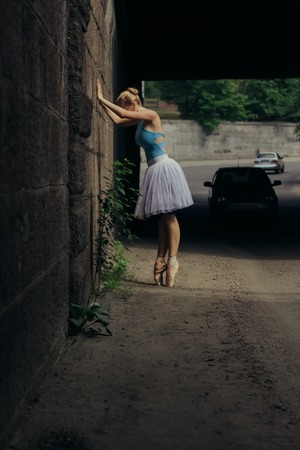 Ballerina posing in the center of Moscow city
