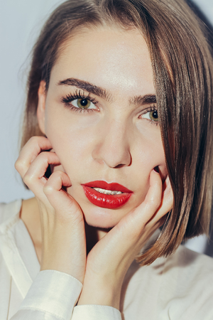 Young woman portrait with dental braces naturalの写真素材