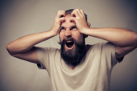 bearded man in shockの写真素材