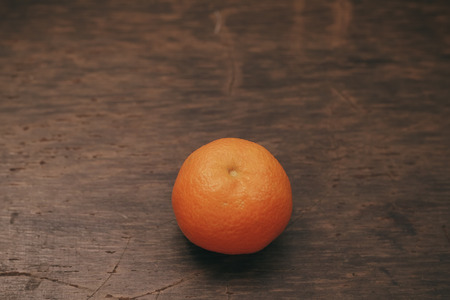fresh mandarine on wooden surface processingの写真素材