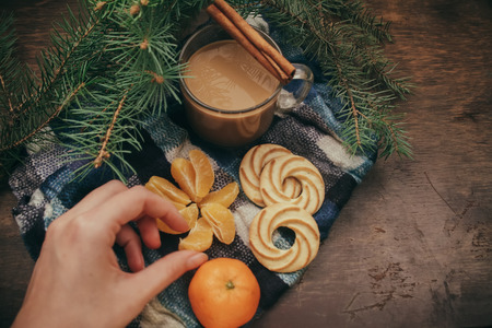 Tangerines and cinnamon sticks, Christmas Tree Coffee on old wooden background