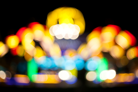 illuminated carousel blurred background, abstract bokeh, background
