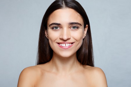 people, luxury and fashion, emotions concept - The young woman's portrait with happy emotionsの写真素材