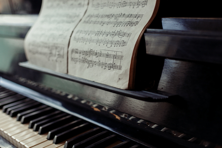 art, Music, old things, vintage and color concept - Old piano keys close up, selective focusの写真素材