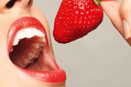 Sexy Woman Eating Strawberry.の写真素材