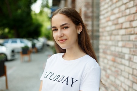 people, emotions, natural, beauty and lifestyle concept -Close-up Fashion woman portrait of young pretty trendy girl posing at the city, summer street fashion, laughing and smiling portrait. trendyの写真素材