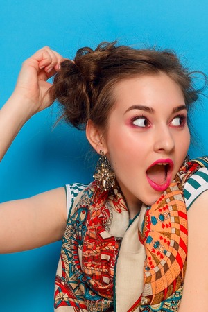 emotions, people, beauty, fashion and lifestyle concept - The portrait of young woman with shocked...
