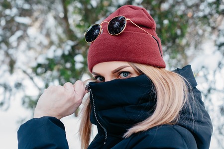 winter, christmas, emotions, people, lifestyle and beauty concept- Christmas girl outdoor portrait....