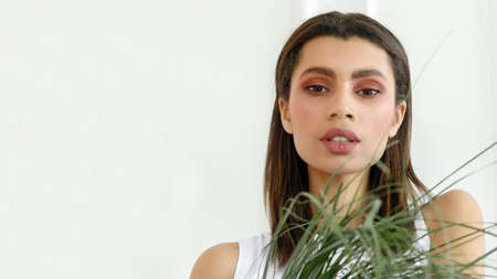 Closeup portrait of beautiful mixed race woman. ortrait of an African woman looking at the camera....