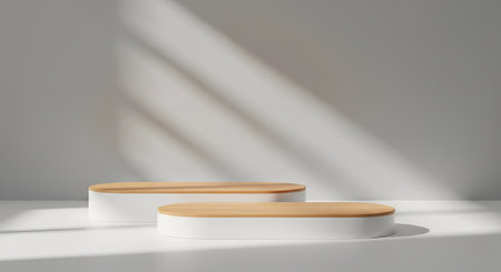 Modern 3D rendering of two wood and white product pedestals on white, illuminated by natural window light casting soft shadows on the backdrop. Perfect for showcasing products.の素材