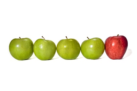 Row of green apples with a red apple at the end   Great concept for the odd man out   Kind of like standing out from the rest の写真素材