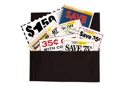 A dark brown cloth wallet full of coupons of various values.