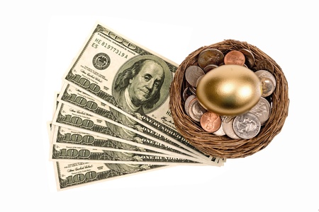 Golden Nest Egg With Lots Of Money Isolated On White