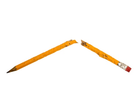Broken chewed pencil isolated on a white background.の写真素材