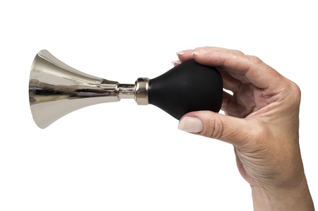 Horizontal shot of a hand holding a horn ready to toot の写真素材