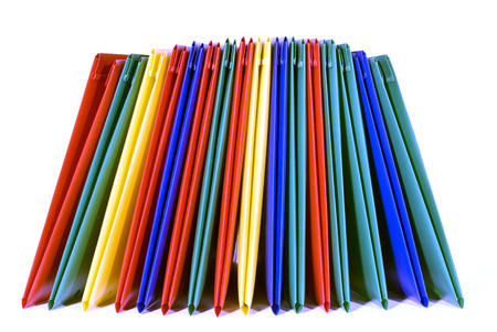 Multicolored Plastic File Folders On White Background