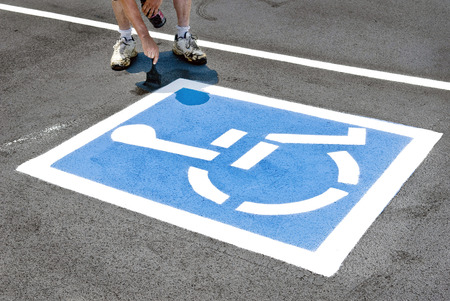 Painting New Handicapped Parking Signの写真素材