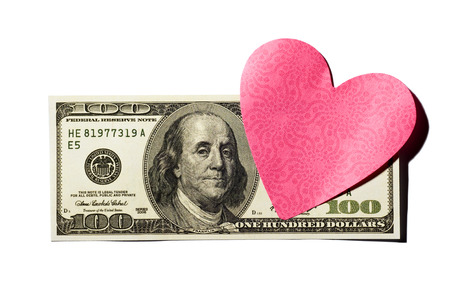 Heartshaped Blank Sticky Note Stuck To Hundred Dollar Billの写真素材