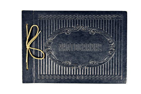 Vintage Or Antique Photo Album With Gold String Tied Bowの写真素材