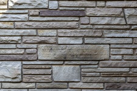 Horizontal shot of a stone wall background.
