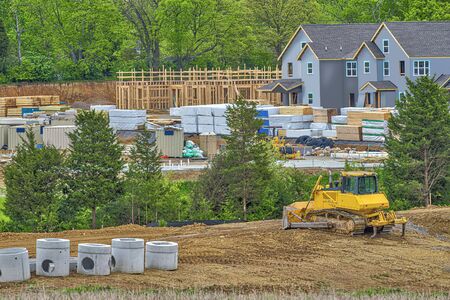 Horizontal shot of an apartment complex under construction.