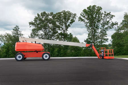 Horizontal side shot of a generic unbranded boom lift.