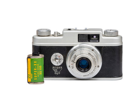 Maryville, Tennessee - February 2, 2023: A 1950s era Argus camera with a roll of Kodak black & white...
