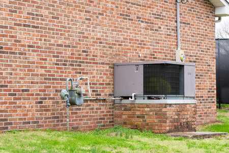 Horizontal shot of a commercial air conditioner outside of a small business.の写真素材