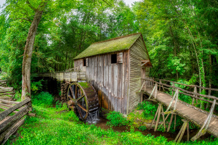 Cades Cove, Tennessee, United States â August 4, 2023: The Cable Grist Mill is one of the most popular attractions in the Cades Cove section of the Great Smoky Mountains National Park.  Cades Cove is the most popular section of the GSMNP, which is the mのeditorial素材