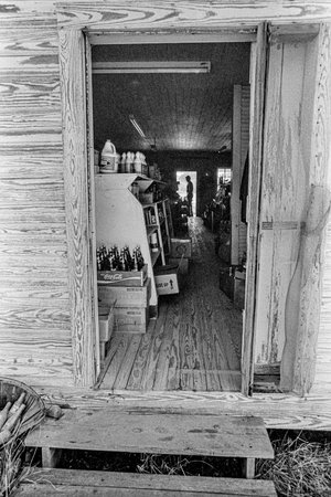 Macedonia, Arkansas, United States â June 23, 2024: Vertical shot of the view through the store from the back door of an old Arkansas country store in 1975.のeditorial素材
