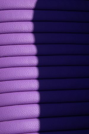 colored leather car seat abstract with strong shadowの写真素材