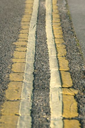 excessive use of double yellow lines on highwayの写真素材