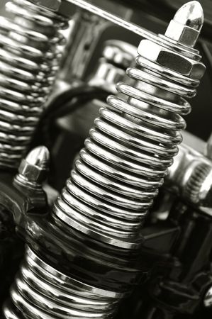 chromed motorcycle suspension springs close-upの写真素材