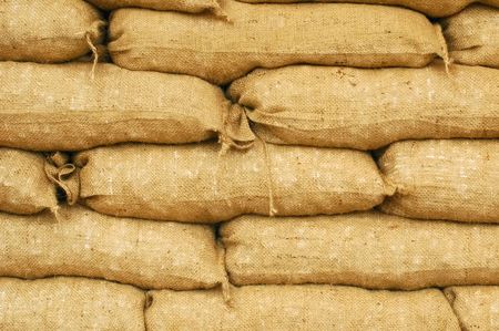 background of sandbags for flood defense or military use