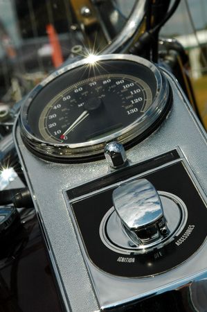 classic motorcycle speedometer and ignition dials in chromeの写真素材
