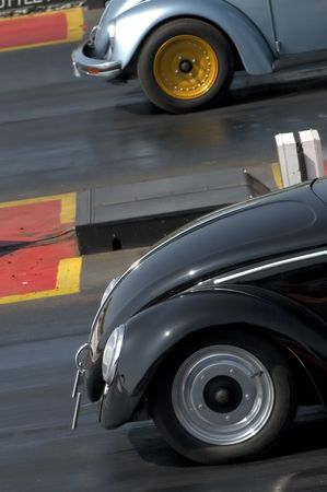 SANTA POD RACEWAY, UK - APRIL 23, 2010: Big Bang Camper and Bus Festival. VW Beetles at the start of a quarter mile drag race. Santa Pod Raceway, UK, April 23, 2010.のeditorial素材