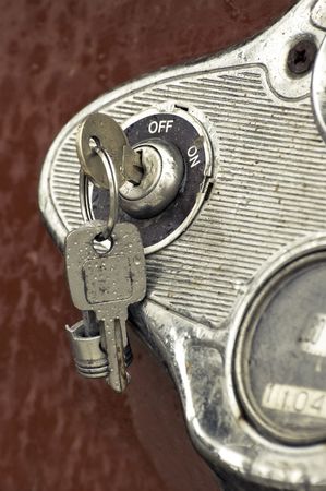 rain covered keys in a rusting auto ignitionの写真素材