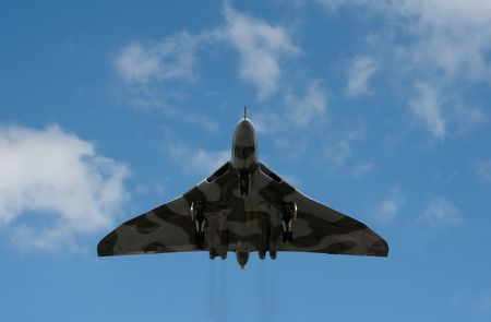 Farnborough International Air Show, Hampshire, UK - JULY 16, 2010: Low level pass by the last surviving Vulcan Bomber during pre-show practice.のeditorial素材