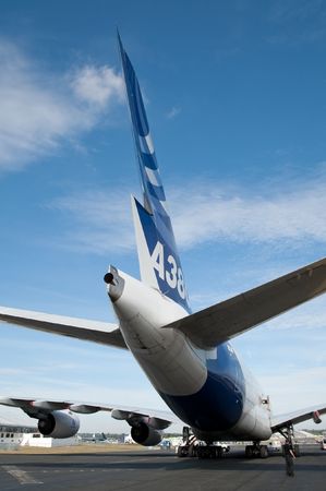 Farnborough International Airshow, UK - July 24, 2010: Wide view of Airbus A380 tail and rudder ailerons.のeditorial素材