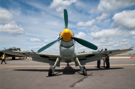 Farnborough International Airshow, UK - July 24, 2010: WW2 German Messerschmitt BF-109 fighter and ground crew.のeditorial素材