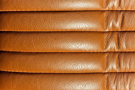 background of old worn brown leatherの写真素材