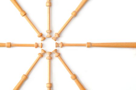 web of wooden lacemaking bobbin spindles on whiteの写真素材