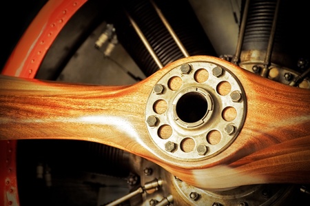 vintage wooden aircraft propeller and engine cylindersの写真素材