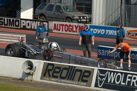 SANTA POD RACEWAY, UNITED KINGDOM - APRIL 23, 2010: Piers Ward, Top Gear magazine editor and drag racing novice, in the drivers seat researching for an article on extreme motorsport.のeditorial素材
