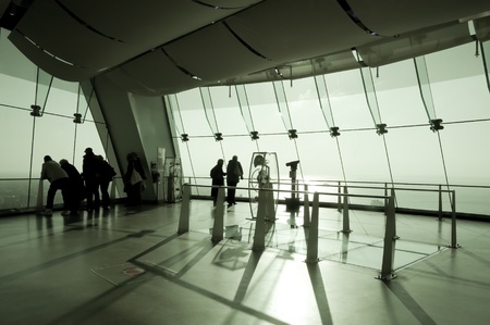 Portsmouth, UK - February 1, 2012: Muted green, anti-glare glass interior of the 560ft (170m) Spinnaker Tower observation deck.のeditorial素材